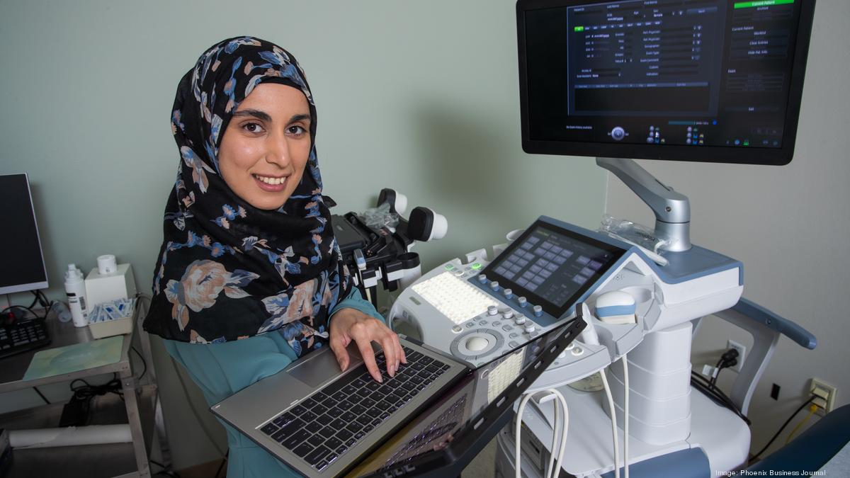Aziza Ismail at a clinical workstation, Phoenix Business Journal